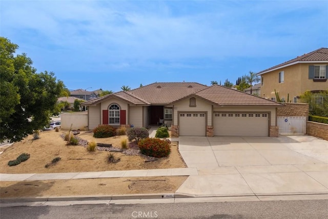 2631 Harvest Crest Ln, Corona, CA 92881 - ranch-style home featuring an attached garage, driveway, and a tiled roof