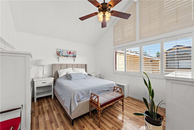 12750 Centralia St Unit 159, Lakewood, CA 90715 - bedroom featuring high vaulted ceiling, wood finished floors, and a ceiling fan