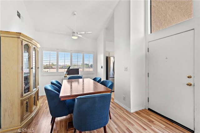 12750 Centralia St Unit 159, Lakewood, CA 90715 - dining room featuring light wood-style floors, a ceiling fan, an office area, and high vaulted ceiling