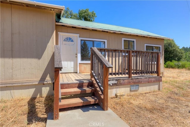 13545 Surcease Mine Rd, Oroville, CA 95965 - property entrance featuring a wooden deck and a metal roof
