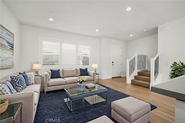 6508 Alondra Blvd, Paramount, CA 90723 - living room featuring wood finished floors, stairway, and recessed lighting