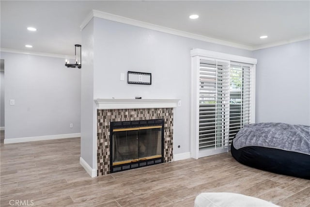 72 Corniche Dr Unit C, Dana Point, CA 92629 - living area featuring ornamental molding, wood finished floors, a fireplace, recessed lighting, and a chandelier