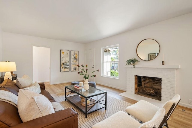 1157 Steffen St, Glendora, CA 91741 - living room featuring a fireplace and light wood finished floors
