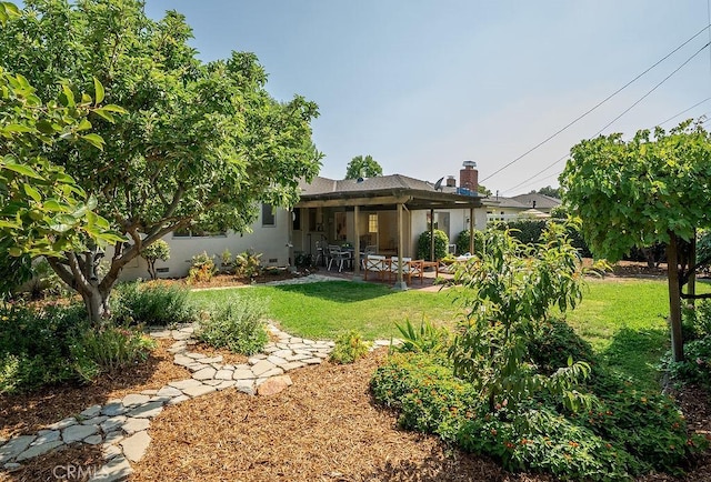 1157 Steffen St, Glendora, CA 91741 - back of house featuring a patio area, a yard, and a chimney
