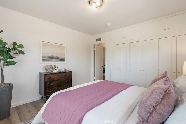 1157 Steffen St, Glendora, CA 91741 - bedroom featuring wood finished floors and a closet