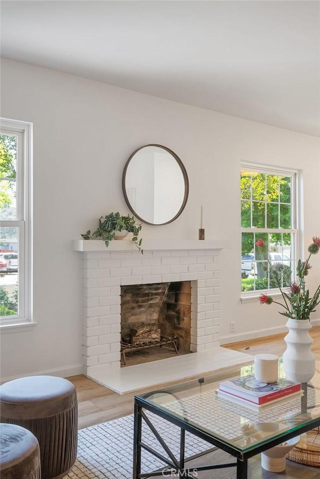 1157 Steffen St, Glendora, CA 91741 - living room with plenty of natural light, a fireplace, and light wood-style floors