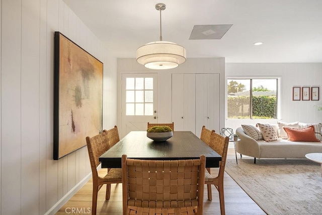 1157 Steffen St, Glendora, CA 91741 - dining room featuring light wood-style flooring, healthy amount of natural light, and a decorative wall
