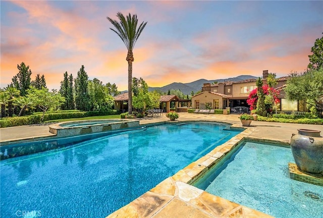1377 Versante Cir, Corona, CA 92881 - view of swimming pool featuring a gazebo, a pool with connected hot tub, and a patio
