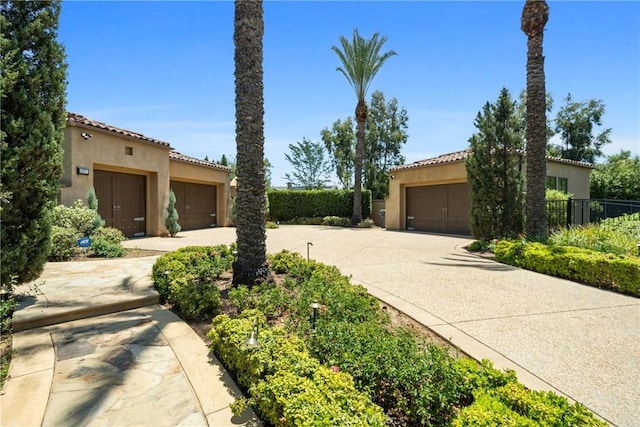 1377 Versante Cir, Corona, CA 92881 - view of front of home featuring stucco siding and a tiled roof