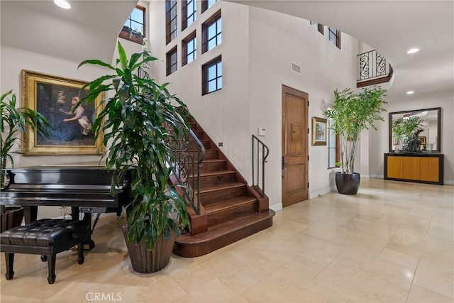 1377 Versante Cir, Corona, CA 92881 - community lobby featuring stairs, a towering ceiling, and recessed lighting