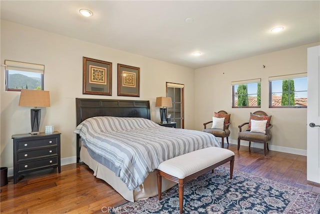1377 Versante Cir, Corona, CA 92881 - bedroom with hardwood / wood-style flooring and recessed lighting