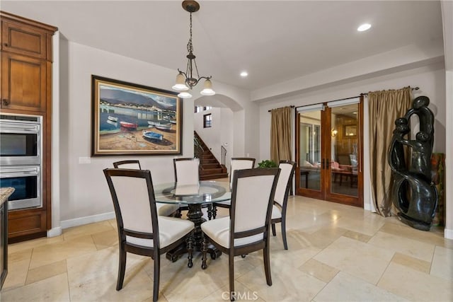1377 Versante Cir, Corona, CA 92881 - dining area featuring french doors, recessed lighting, stairs, arched walkways, and light tile patterned floors