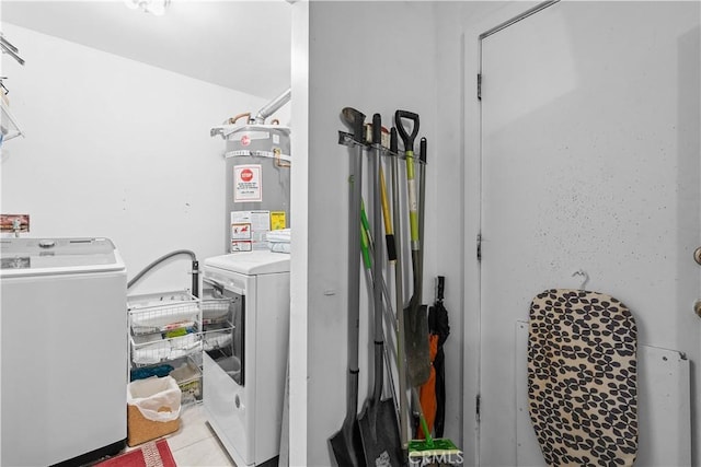 1876 Sparrow Rd, Wrightwood, CA 92397 - washroom with washer / clothes dryer, secured water heater, and tile patterned floors