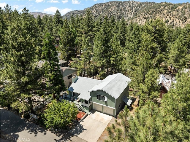 1876 Sparrow Rd, Wrightwood, CA 92397 - view of subject property featuring a heavily wooded area and a mountain backdrop