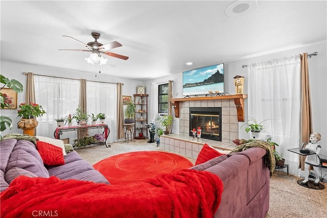 1876 Sparrow Rd, Wrightwood, CA 92397 - living area with carpet, ceiling fan, and a tile fireplace