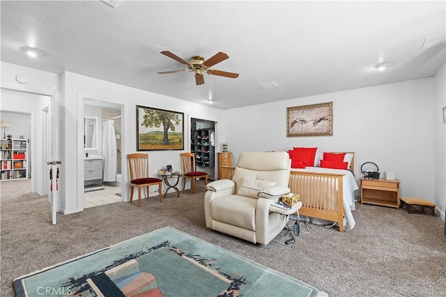 1876 Sparrow Rd, Wrightwood, CA 92397 - carpeted bedroom featuring connected bathroom and a ceiling fan