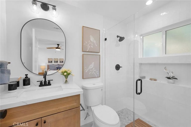 351 Vista Pl, Los Angeles, CA 90042 - bathroom featuring vanity, a stall shower, and a ceiling fan