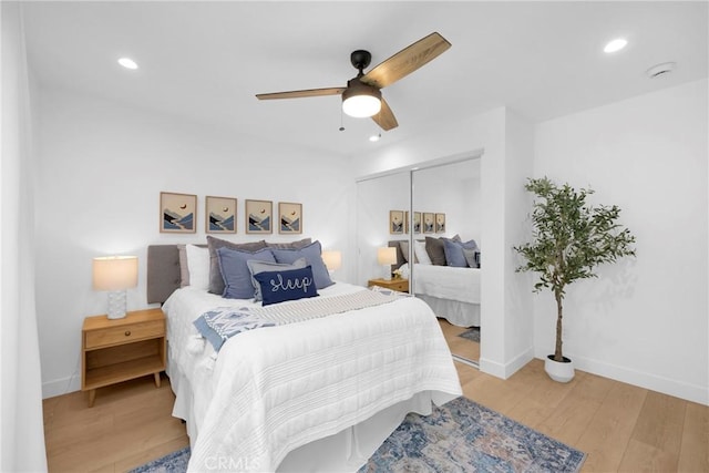 351 Vista Pl, Los Angeles, CA 90042 - bedroom with light wood-type flooring, recessed lighting, a ceiling fan, and a closet