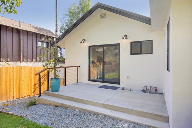 351 Vista Pl, Los Angeles, CA 90042 - rear view of house with stucco siding and a patio area