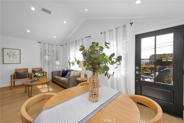 351 Vista Pl, Los Angeles, CA 90042 - dining space featuring lofted ceiling, light wood-style floors, and recessed lighting