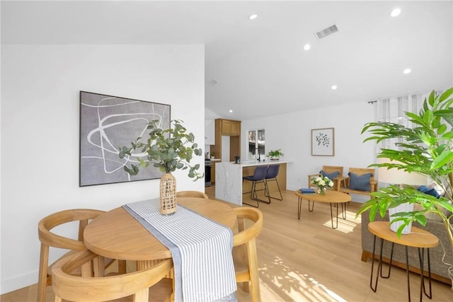 351 Vista Pl, Los Angeles, CA 90042 - dining room featuring light wood finished floors and recessed lighting