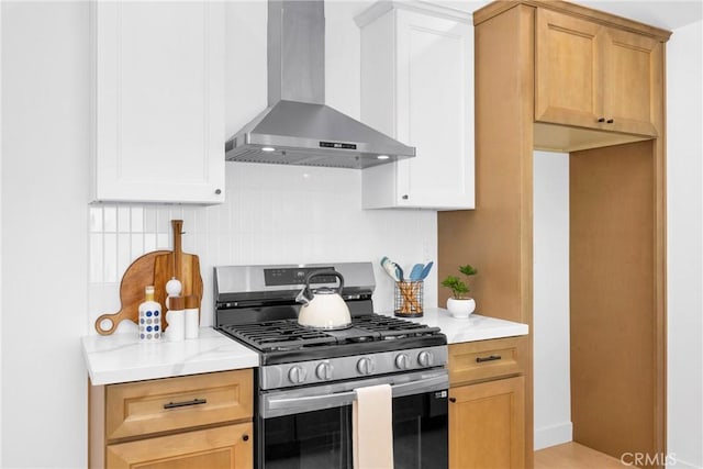 351 Vista Pl, Los Angeles, CA 90042 - kitchen featuring wall chimney exhaust hood, gas stove, decorative backsplash, and light countertops