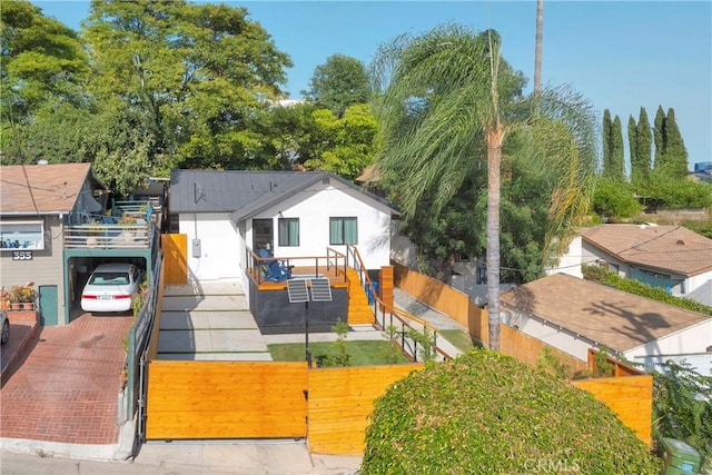 351 Vista Pl, Los Angeles, CA 90042 - view of front facade with a fenced front yard, a gate, and stucco siding