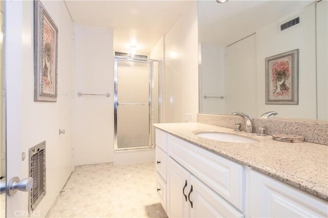 740 S Orange Grove Blvd Unit 7, Pasadena, CA 91105 - bathroom with a shower with shower door, vanity, and heating unit
