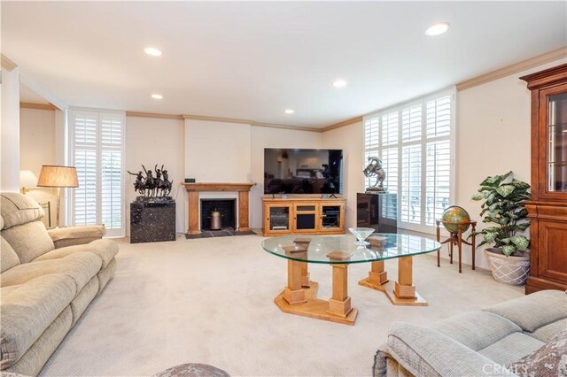 740 S Orange Grove Blvd Unit 7, Pasadena, CA 91105 - living area with light colored carpet, a fireplace with raised hearth, crown molding, and recessed lighting