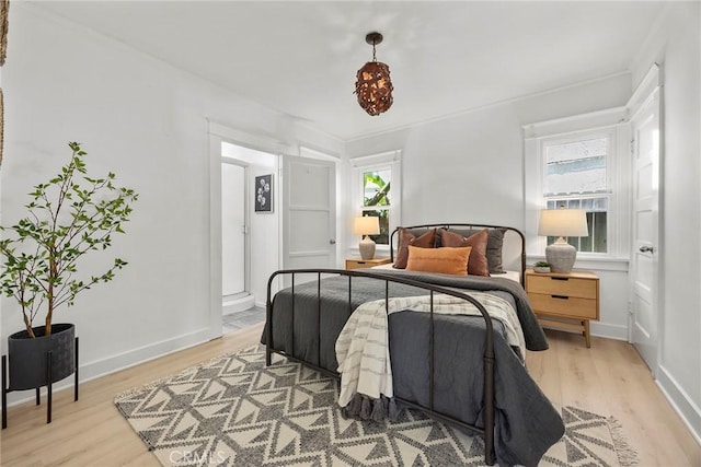 1111 Dawson Ave, Long Beach, CA 90804 - bedroom featuring light wood-type flooring and baseboards