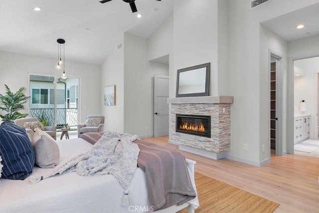 2117 Marshallfield Ln Unit B, Redondo Beach, CA 90278 - bedroom with wood finished floors, a fireplace, high vaulted ceiling, recessed lighting, and connected bathroom