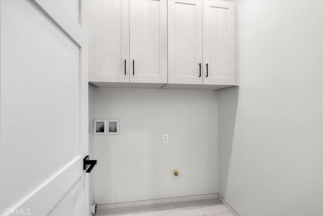 2117 Marshallfield Ln Unit B, Redondo Beach, CA 90278 - laundry area with cabinet space, hookup for a washing machine, and light marble finish flooring
