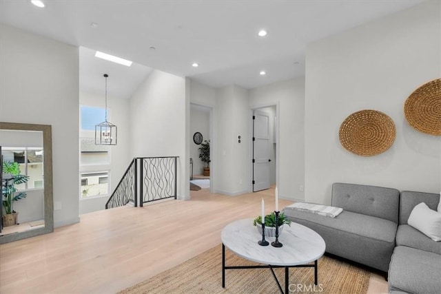 2117 Marshallfield Ln Unit B, Redondo Beach, CA 90278 - living area with light wood-style floors, recessed lighting, and healthy amount of natural light