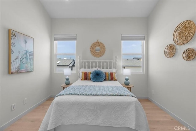 2117 Marshallfield Ln Unit B, Redondo Beach, CA 90278 - bedroom featuring multiple windows and light wood finished floors