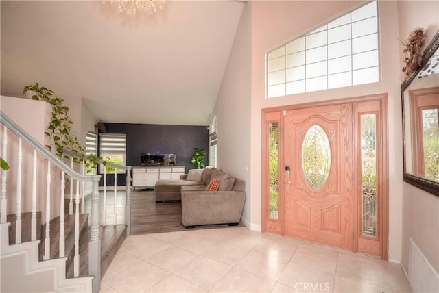 7008 Davenport Ct, Rancho Cucamonga, CA 91701 - tiled foyer entrance with stairs and a high ceiling