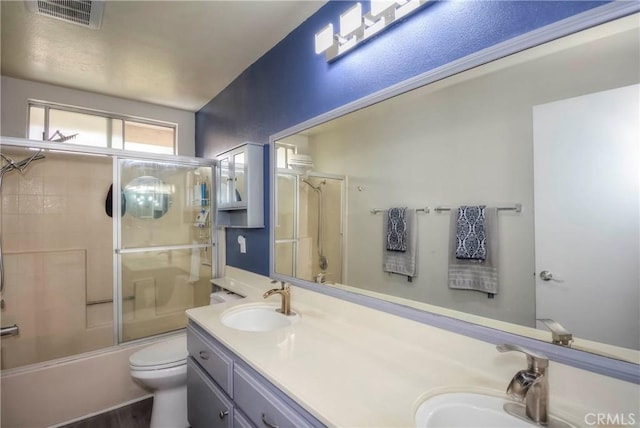 7008 Davenport Ct, Rancho Cucamonga, CA 91701 - bathroom featuring double vanity and shower / bath combination with glass door