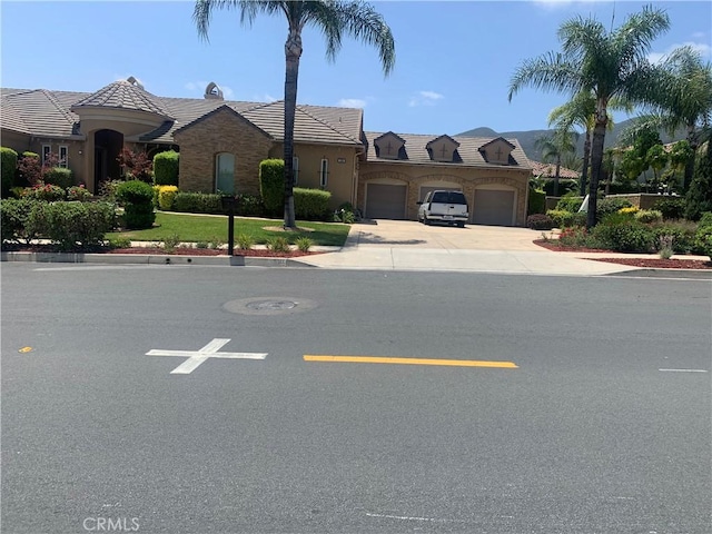 1180 Cleveland Way, Corona, CA 92881 - view of front of property featuring a garage, driveway, and a tile roof