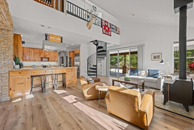 26380 San Felipe Rd, Warner Springs, CA 92086 - living room with a towering ceiling, stairway, and light wood finished floors