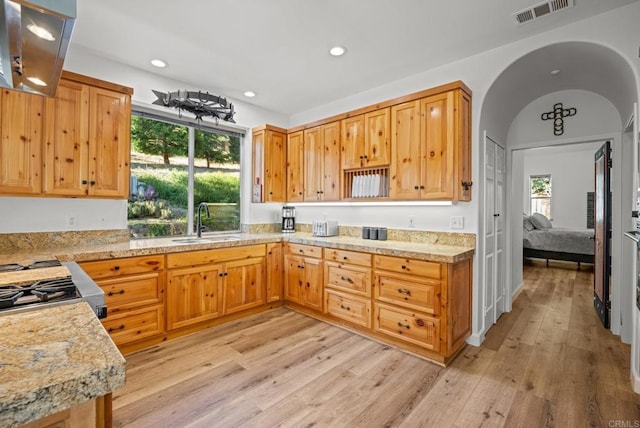 26380 San Felipe Rd, Warner Springs, CA 92086 - kitchen with range hood, light wood-style flooring, recessed lighting, healthy amount of natural light, and arched walkways