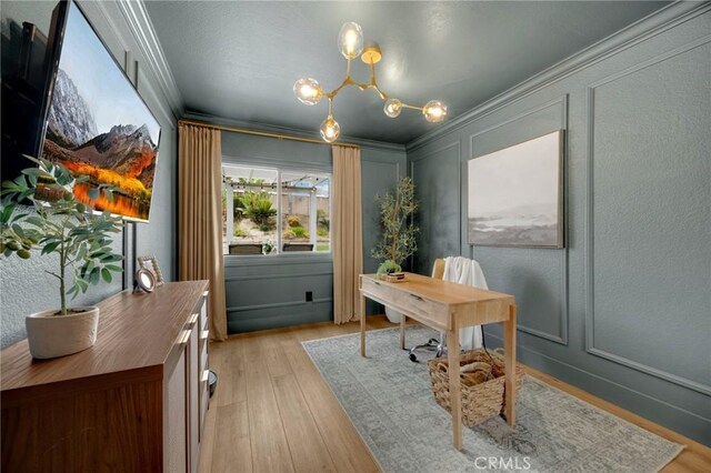 637 Silver Bridle Rd, Walnut, CA 91789 - home office with a decorative wall, ornamental molding, light wood-type flooring, and a chandelier
