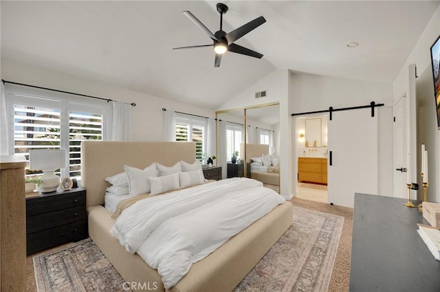 637 Silver Bridle Rd, Walnut, CA 91789 - bedroom with high vaulted ceiling, a barn door, ensuite bathroom, and a ceiling fan