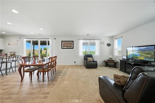 14160 Hercules St, Hesperia, CA 92345 - living room featuring recessed lighting and light wood finished floors