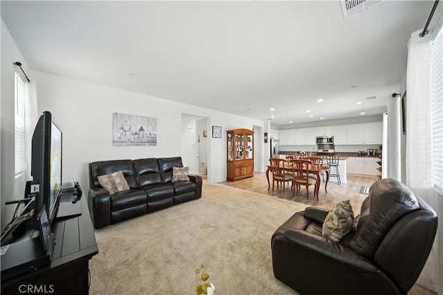 14160 Hercules St, Hesperia, CA 92345 - living area featuring recessed lighting, light wood-type flooring, and ornate columns