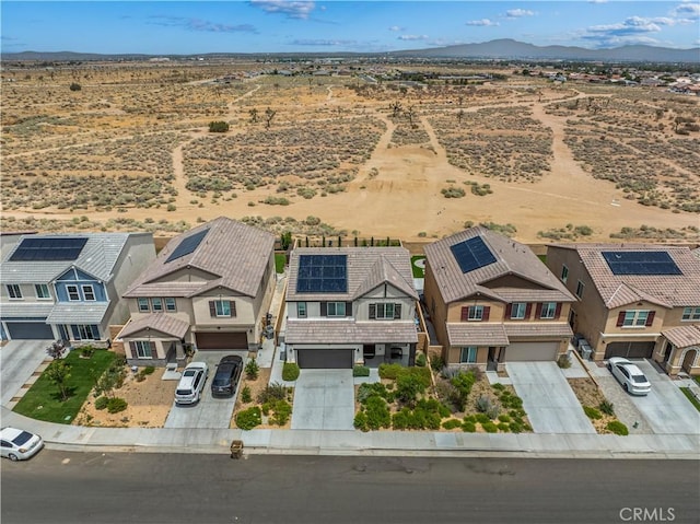 14160 Hercules St, Hesperia, CA 92345 - aerial perspective of suburban area featuring a mountainous background and a desert landscape