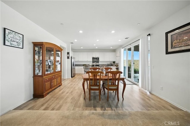 14160 Hercules St, Hesperia, CA 92345 - dining room featuring recessed lighting and light wood-style floors