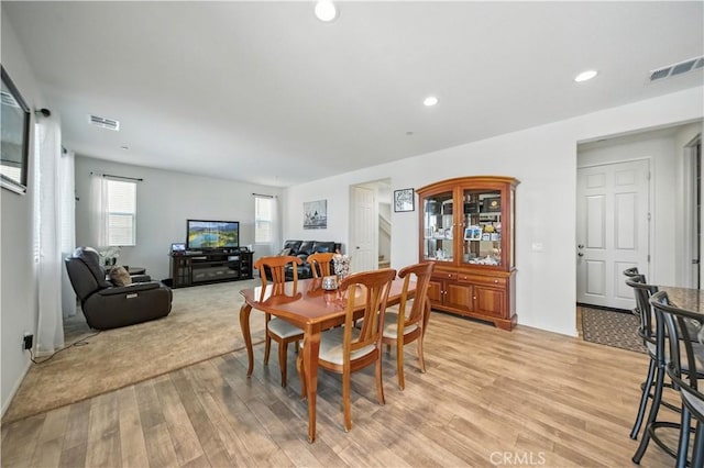 14160 Hercules St, Hesperia, CA 92345 - dining room with light wood-style floors and recessed lighting
