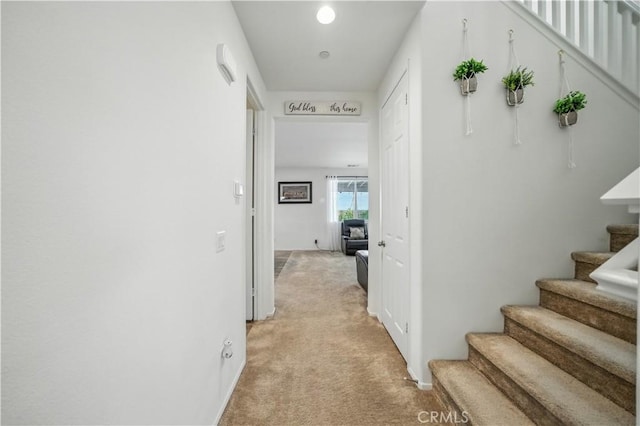 14160 Hercules St, Hesperia, CA 92345 - hallway featuring stairway and light colored carpet