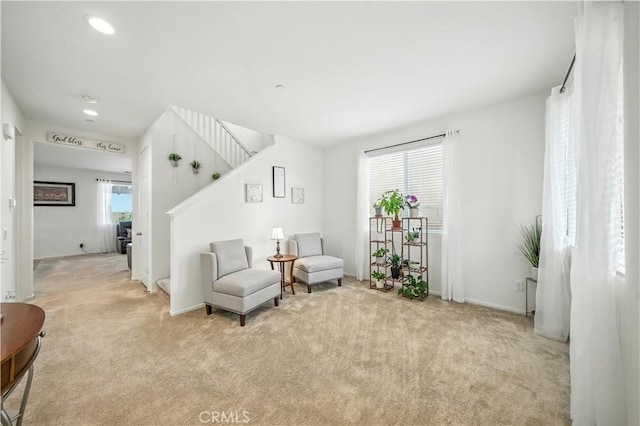 14160 Hercules St, Hesperia, CA 92345 - living area with stairs, carpet floors, and recessed lighting