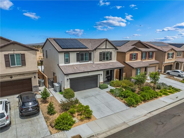 14160 Hercules St, Hesperia, CA 92345 - view of property with stucco siding, an attached garage, driveway, solar panels, and a residential view