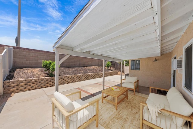 27583 Genevieve Dr, Menifee, CA 92586 - fenced backyard featuring a patio, a wall mounted air conditioner, and an outdoor hangout area